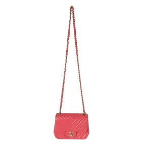 CHANEL Chevron Pink Lambskin Mini Flap Bag