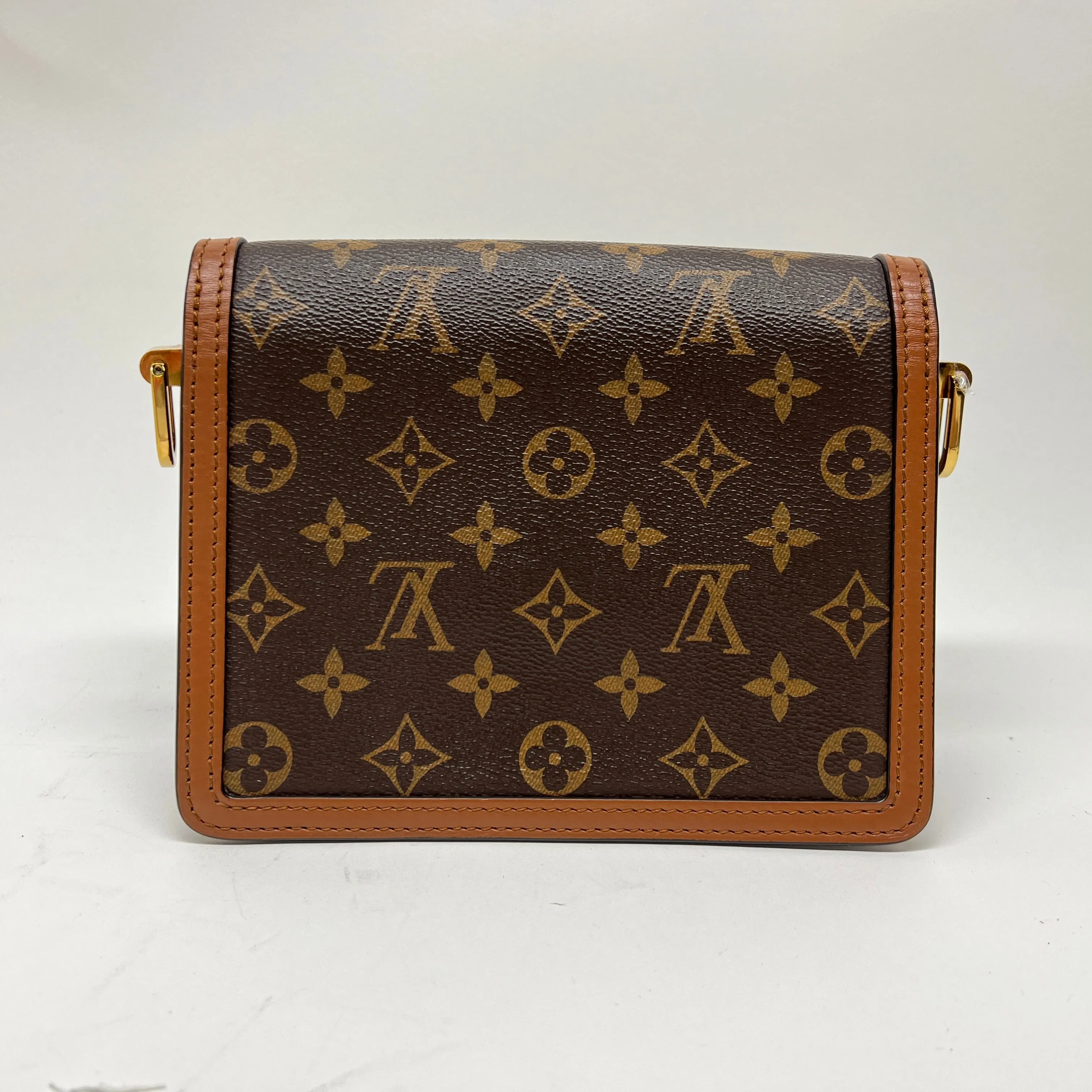 Dauphine Reverse Mini Brown Crossbody Bag in Monogram Coated Canvas, Gold hardware